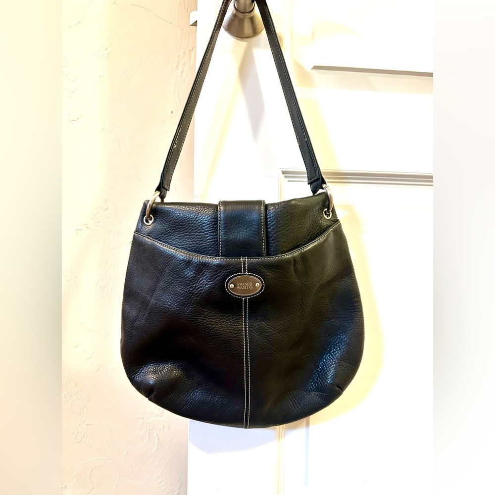 Franco Sarto Black Leather Shoulder Bag with snap front and pocket in back.